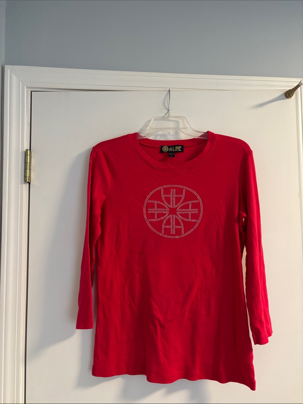 A-Line red long-sleeve crewneck with rhinestone-embellished design